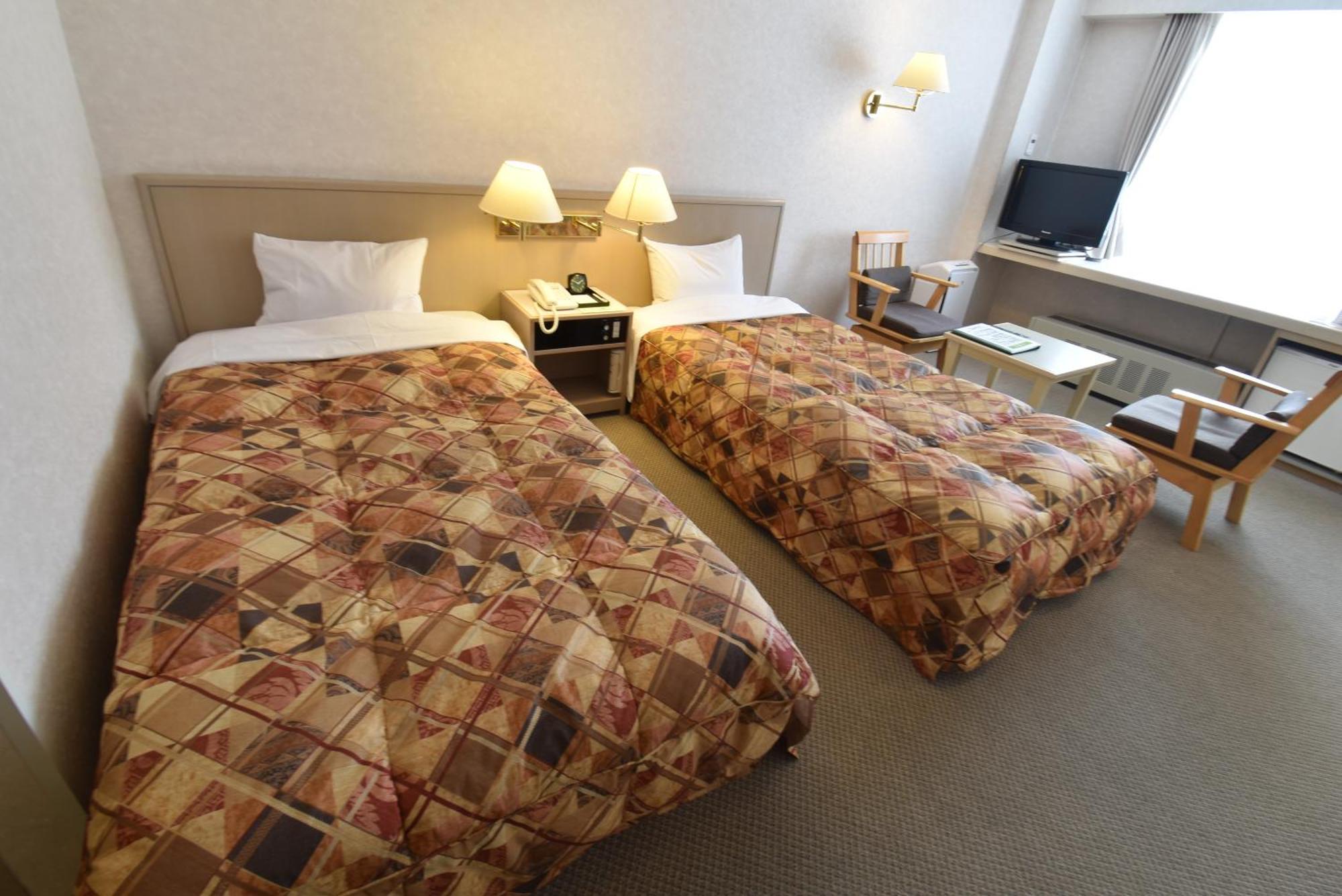 Biei Shirogane Onsen Hotel Park Hills Quarto foto